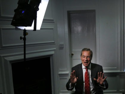 Former UK Independence Party (UKIP) leader Nigel Farage gestures during an interview with The Associated Press in London, Tuesday, Nov. 29, 2016. Farage addressed the media on how he met US President-elect Donald Trump last week. (AP Photo/Frank Augstein)
