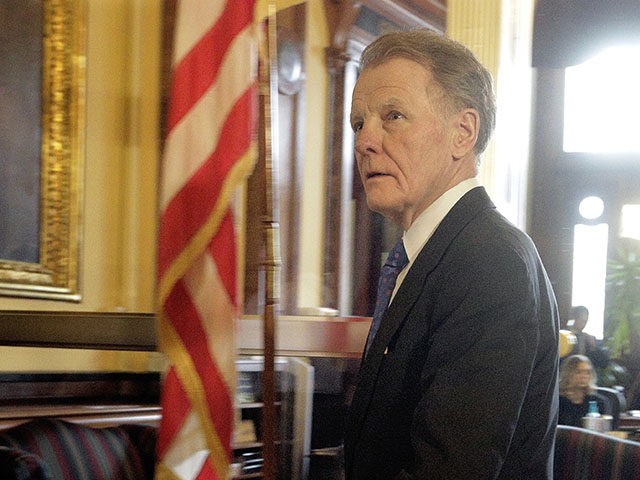 Illinois Speaker of the House Michael Madigan, D-Chicago, walks out of Illinois Gov. Bruce Rauner's office during veto session at the Illinois State Capitol Wednesday, Nov. 30, 2016, in Springfield, Ill. (AP Photo/Seth Perlman)