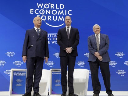 Klaus Schwab, founder and Executive Chairman of the World Economic Forum, Britain's Prince William, and Sir David Attenborough, broadcaster and natural historian, from left to right, stand together during a session at the annual meeting of the World Economic Forum in Davos, Switzerland, Tuesday, Jan. 22, 2019. (AP Photo/Markus Schreiber)