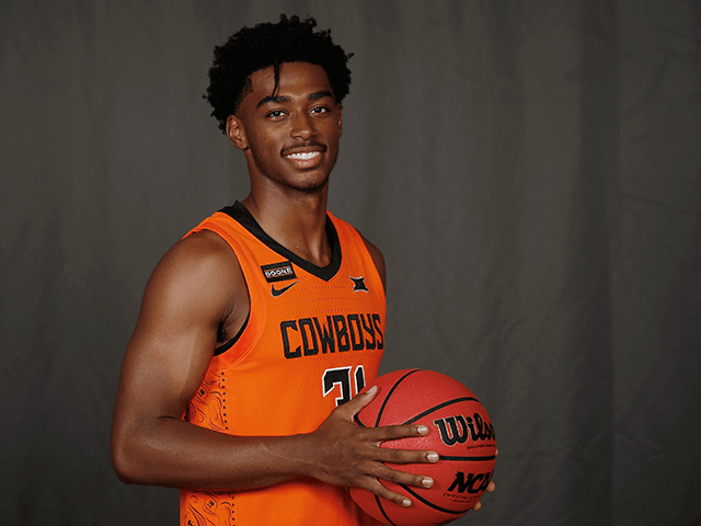 Oklahoma State guard Dee Mitchell poses for a photo during media day Tuesday, Sept. 24, 20