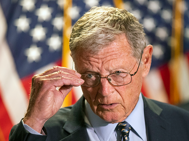 Senate Armed Services Committee Chairman James Inhofe, R-Okla., speaks to reporters follow