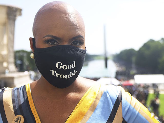 Rep. Ayanna Pressley, D-Mass., poses for a portrait during the March on Washington, Friday Aug. 28, 2020, in Washington, on the 57th anniversary of the Rev. Martin Luther King Jr.'s "I Have A Dream" speech. (Michael M. Santiago/Pool via AP)