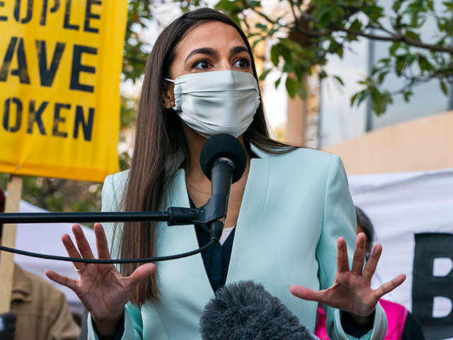 Rep. Alexandria Ocasio-Cortez, D-N.Y., speaks, Thursday, Nov. 19, 2020, outside the Democr