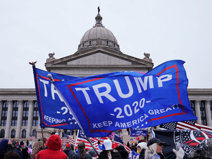 Trump supporters rally at the state Capitol, Wednesday, Jan. 6, 2021, in Oklahoma City. (AP Photo/Sue Ogrocki)