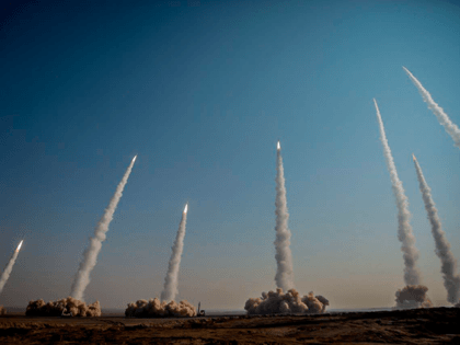 In this photo released on Friday, Jan. 15, 2021, by the Iranian Revolutionary Guard, missiles are launched in a drill in Iran. Iran's paramilitary Revolutionary Guard forces on Friday held a military exercise involving ballistic missiles and drones in the country's central desert, state TV reported, amid heightened tensions over …