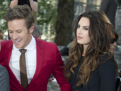 Armie Hammer and wife Elizabeth Chambers, right, arrive for the UK premiere of The Lone Ranger at a central London cinema in Leicester Square, Sunday, July 21, 2013. (Photo by Joel Ryan/Invision/AP)