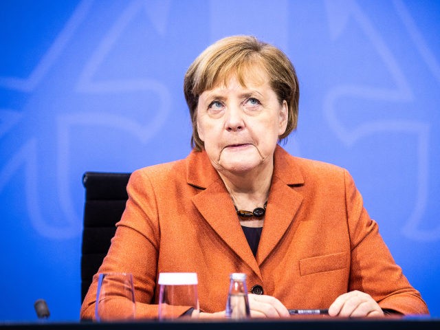 BERLIN, GERMANY - DECEMBER 13: German Chancellor Angela Merkel speaks to the media about new, stricter lockdown measures following a meeting of federal and states government leaders on December 13, 2020 in Berlin, Germany. Germany has seen record numbers of daily new infections and deaths in recent days despite a …