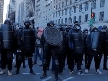 Antifa/BLM demonstrators march in Manhattan carrying defensive shields. (Twitter Video Screenshot/Andy Ngo)