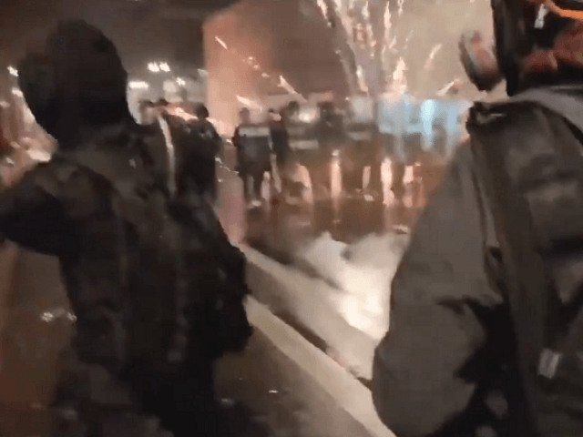 Antifa attack Portland police officers with commercial-grade fireworks and firebombs. (Twitter Video Screenshot/Kitty Boomhauer)