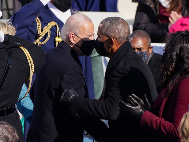 WASHINGTON, DC - JANUARY 20: U.S. President Joe Biden greets former U.S. President Barack