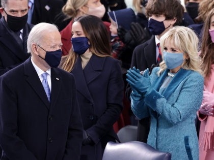 WASHINGTON, DC - JANUARY 20: U.S. President-elect Joe Biden and Jill Biden arrive at Biden's inauguration on the West Front of the U.S. Capitol on January 20, 2021 in Washington, DC. During today's inauguration ceremony Joe Biden becomes the 46th president of the United States. (Photo by Alex Wong/Getty Images)