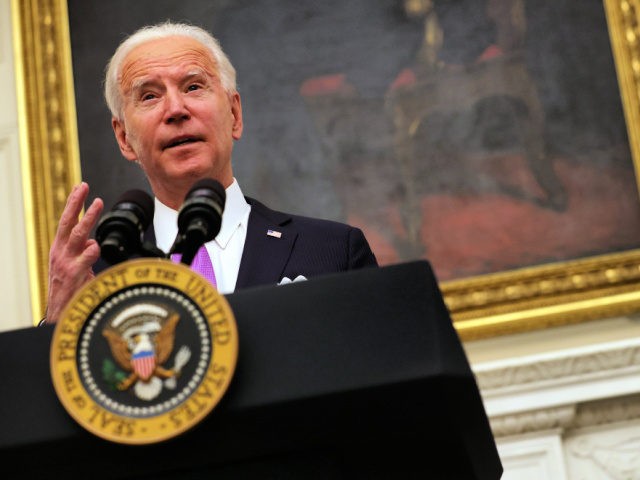 WASHINGTON, DC - JANUARY 21: U.S. President Joe Biden speaks during an event in the State Dining Room of the White House January 21, 2021 in Washington, DC. President Biden delivered remarks on his administration’s COVID-19 response, and signed executive orders and other presidential actions. (Photo by Alex Wong/Getty Images)