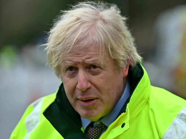 MANCHESTER, ENGLAND - JANUARY 21: Prime Minister Boris Johnson visits a storm basin near the River Mersey in Didsbury on January 21, 2021 in Manchester, England. A major incident has been declared in Greater Manchester after Storm Christophe caused flooding in the area, forcing thousands of homes to be evacuated. …