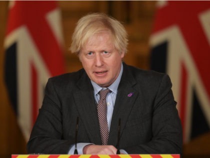 LONDON, ENGLAND - JANUARY 27: Prime Minister Boris Johnson speaks during a press conference at Downing Street on January 27, 2021 in London, England. Johnson told the House of Commons today that he hoped Schools would return on 8 March 2021. He also said travelers returning from 22 'red list' …