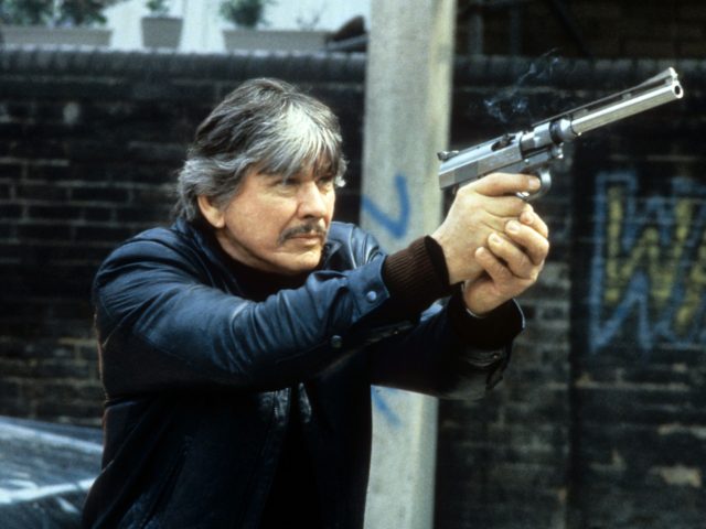 Charles Bronson aiming weapon in a scene from the film 'Death Wish 3', 1985. (Photo by Can