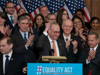 Senate Democratic Leader Chuck Schumer, D-N.Y., flanked by House Judiciary Committee Chairman Jerrold Nadler, D-N.Y., left, and Rep. David Cicilline, D-R.I., right, joins fellow Democrats in the House as they announce the introduction of The Equality Act, a comprehensive nondiscrimination bill for LGBT rights, at the Capitol in Washington, Wednesday, …