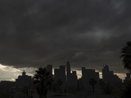 Dark LA skyline (Damian Dovarganes / Associated Press)