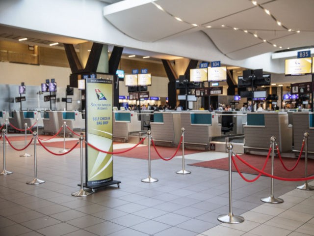 Empty SAA (South African Airways) check-in counters are seen at the O.R. Tambo Internation