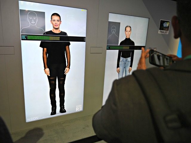 Attendees visit the Neon booth January 10, 2020 on the final day of the 2020 Consumer Electronics Show (CES) in Las Vegas, Nevada. - The startup company's goal is to create artificial humans or computationally created virtual beings which they call Neons. (Photo by Robyn Beck / AFP) (Photo by …