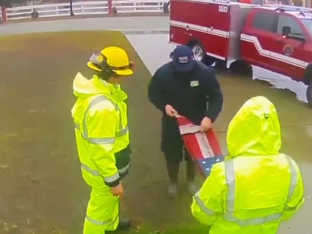 Firefighters save an American flag