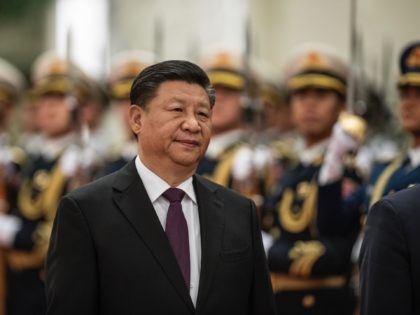 China's President Xi Jinping reviews a military honour guard during a welcome ceremony at the Great Hall of the People in Beijing on December 10, 2018. (Photo by FRED DUFOUR / AFP) (Photo credit should read FRED DUFOUR/AFP via Getty Images)