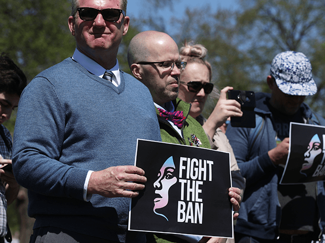 Activists participate in a rally at the Reflecting Pool of the U.S. Capitol April 10, 2019