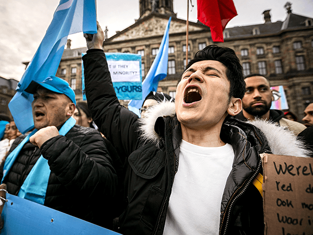 Members of the Uighur community and sympathizers demonstrate on the Dam square in Amsterda
