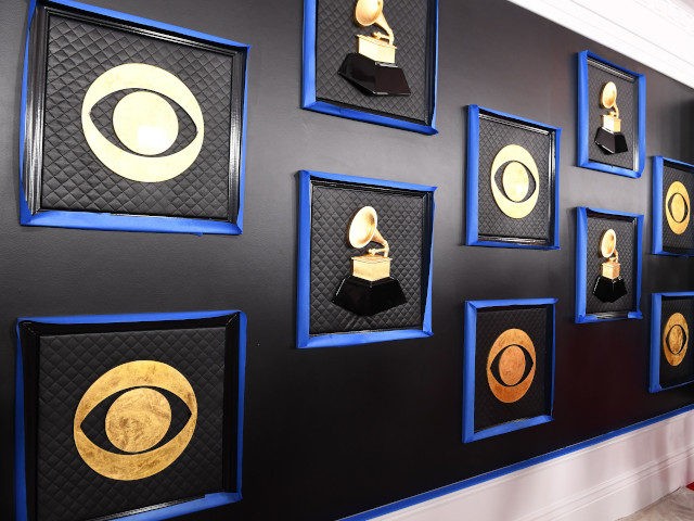 The CBS and Grammy logos are seen on a backdrop as the celebrity arrival area is being set up ahead of the 62nd Annual Grammy awards at LA Live, in Los Angeles, California, on January 24, 2020. (Photo by VALERIE MACON / AFP) (Photo by VALERIE MACON/AFP via Getty Images)