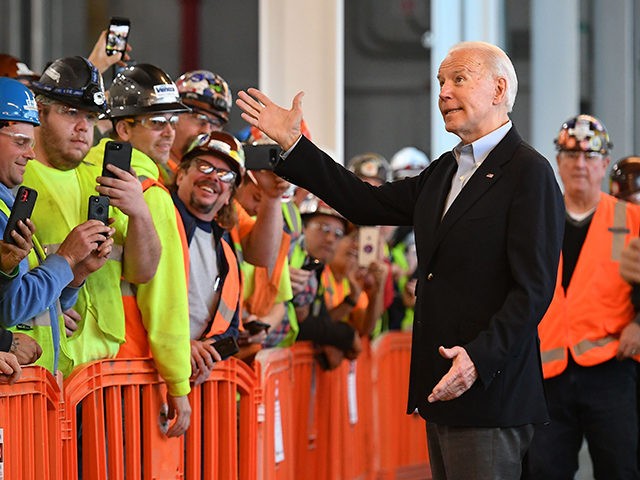 Democratic presidential candidate Joe Biden meets workers as he tours the Fiat Chrysler plant in Detroit, Michigan on March 10, 2020. (Photo by MANDEL NGAN / AFP) (Photo by MANDEL NGAN/AFP via Getty Images)