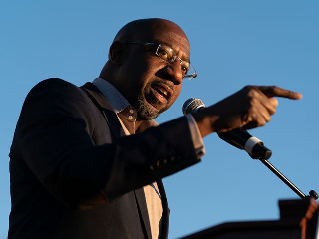 JONESBORO, GA - NOVEMBER 19: Democratic U.S. Senate candidate Raphael Warnock speaks at a campaign event on November 19, 2020 in Jonesboro, Georgia. Democratic U.S. Senate candidates Raphael Warnock and Jon Ossoff are campaigning in the state ahead of their January 5 runoff races against Sen. Kelly Loeffler (R-GA) and …
