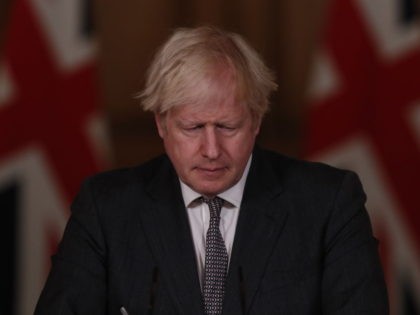 LONDON, ENGLAND - DECEMBER 30: UK Prime Minister Boris Johnson talks at a virtual press conference announcing reviewed Coronavirus tier restrictions, at 10 Downing Street on December 30, 2020 in London, England. The UK government announces that more areas of England will move into the strictest tier for Coronavirus restrictions …