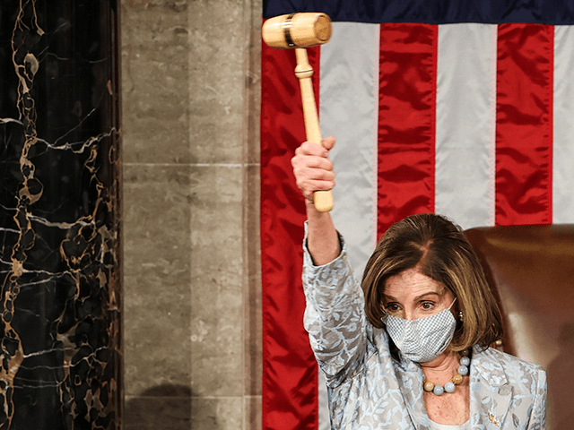 Speaker of the House Nancy Pelosi (D-CA) waves a gavel during the first session of the 117