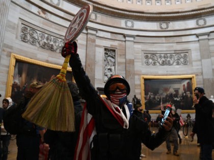 Supporters of US President Donald Trump enter the US Capitol's Rotunda on January 6, 2021, in Washington, DC. - Demonstrators breeched security and entered the Capitol as Congress debated the a 2020 presidential election Electoral Vote Certification. (Photo by Saul LOEB / AFP) (Photo by SAUL LOEB/AFP via Getty Images)