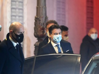 Italy's Prime Minister Giuseppe Conte (C) leaves the Palazzo Madama in Rome on Januar