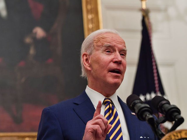 US President Joe Biden speaks about the Covid-19 response before signing executive orders for economic relief to Covid-hit families and businesses in the State Dining Room of the White House in Washington, DC, on January 22, 2021. (Photo by Nicholas Kamm / AFP) (Photo by NICHOLAS KAMM/AFP via Getty Images)