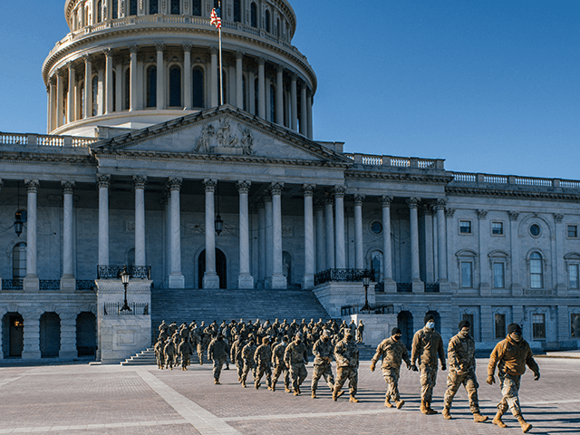 National Guard Citizen-soldiers exit after a U.S. Capitol tour on January 23, 2021 in Washington, DC. Due to COVID-19, Capitol tours had been restricted since March 13, 2020, but have exclusively been reopened for National Guard members. (Photo by Brandon Bell/Getty Images)