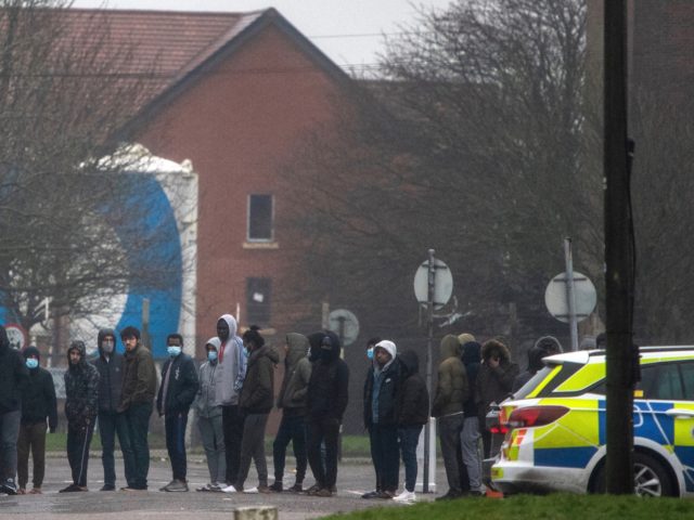 FOLKESTONE, ENGLAND - JANUARY 30: Asylum Seekers are seen at Napier Barracks following a f