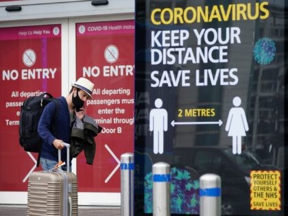 BIRMINGHAM, ENGLAND - JULY 27: Passengers wearing protective masks exit the arrivals termi