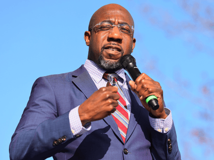 Georgia Democratic Senate candidate Rev. Raphael Warnock speaks at an Augusta canvass launch block party at Robert Howard Community Center on January 04, 2021 in Hephzibah, Georgia. On the final day before the January 5th runoff election, Warnock and Ossoff, who are challenging Republican incumbent senators Kelly Loeffler and David …