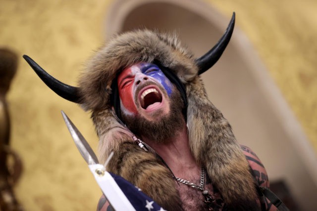 WASHINGTON, DC - JANUARY 06: A protester screams "Freedom" inside the Senate cha