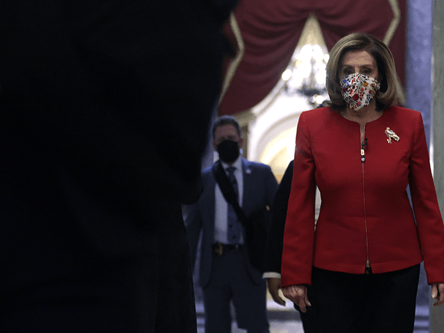 U.S. Speaker Rep. Nancy Pelosi (D-CA) walks in a hallway at the U.S. Capitol January 8, 2021 in Washington, DC. Speaker Pelosi and her leadership team are considering an impeachment process of President Donald Trump after pro-Trump mobs stormed the Capitol and temporarily stopped the process the certification for President-elect …
