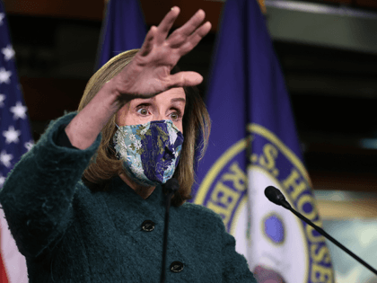 Wearing a face mask to reduce the risk posed by the novel coronavirus pandemic, Speaker of the House Nancy Pelosi (D-CA) holds her weekly news conference in the U.S. Capitol Visitors Center January 28, 2021 in Washington, DC. When asked about what she means when she said Congress has an …