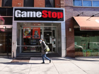 NEW YORK, NEW YORK - JANUARY 28: People walk by a GameStop store in Brooklyn on January 28, 2021 in New York City. Markets continue a volatile streak with the Dow Jones Industrial Average rising over 500 points in morning trading following yesterdays losses. Shares of the video game retailer …