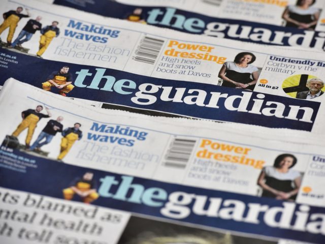 The Guardian newspaper is to cut running costs by 20 percent over three years and may begin charging for some online content following a 25-percent plunge in print advertising, British media reported Tuesday. / AFP / BEN STANSALL (Photo credit should read BEN STANSALL/AFP via Getty Images)