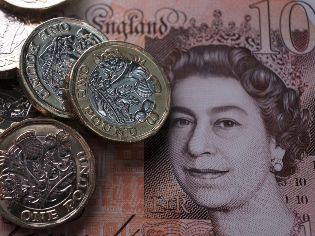 BATH, ENGLAND - OCTOBER 13: In this photo illustration, £1 coins are seen with the new £10 note on October 13, 2017 in Bath, England. Currency experts have warned that as the uncertainty surrounding Brexit continues, the value of the British pound, which has remained depressed against the US dollar and the euro since the UK voted to leave in the EU referendum, is likely to fluctuate. (Photo Illustration by Matt Cardy/Getty Images)