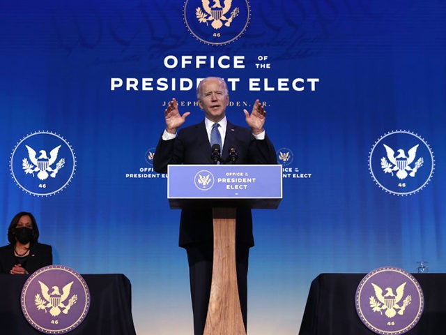 WILMINGTON, DELAWARE - JANUARY 07: U.S. President-elect Joe Biden delivers remarks as vice president-elect Kamala Harris (R) looks on before announcing his choices for attorney general and other leaders of the Justice Department at The Queen theater January 07, 2021 in Wilmington, Delaware. Biden nominated Judge Merrick Garland to be …