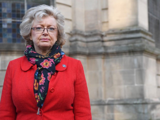 Julie Hambleton, whose sister Maxine died in the 1974 Birmingham pub bombings, gathers with other relatives of the victims of the attacks in the grounds of Birmingham Cathedral in Birmingham, central England, on February 25, 2019, before attending the opening day of the inquest. - Long-awaited inquests into the deaths …