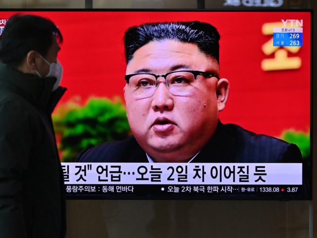A man watches a television screen showing news footage of North Korean leader Kim Jong Un attending the 8th congress of the ruling Workers' Party held in Pyongyang, at a railway station in Seoul on January 6, 2021. (Photo by Jung Yeon-je / AFP) (Photo by JUNG YEON-JE/AFP via Getty …