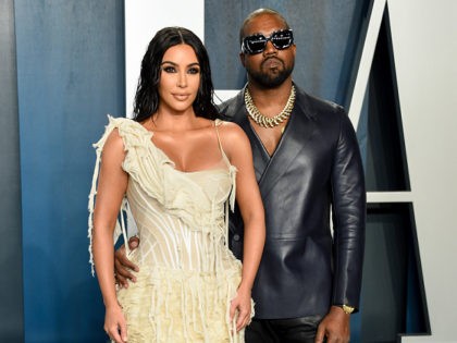 FILE -Kim Kardashian West, left, and Kanye West arrive at the Vanity Fair Oscar Party in Beverly Hills, Calif. on Feb. 9, 2020. Kardashian West is asking the public to show compassion and empathy to husband Kanye West, who she says is bipolar and caused a stir this week after …