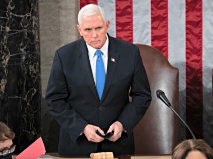 WASHINGTON, DC - JANUARY 06: U.S. Vice President Mike Pence presides over a joint session of Congress on January 06, 2021 in Washington, DC. Congress held a joint session today to ratify President-elect Joe Biden's 306-232 Electoral College win over President Donald Trump. A group of Republican senators said they …